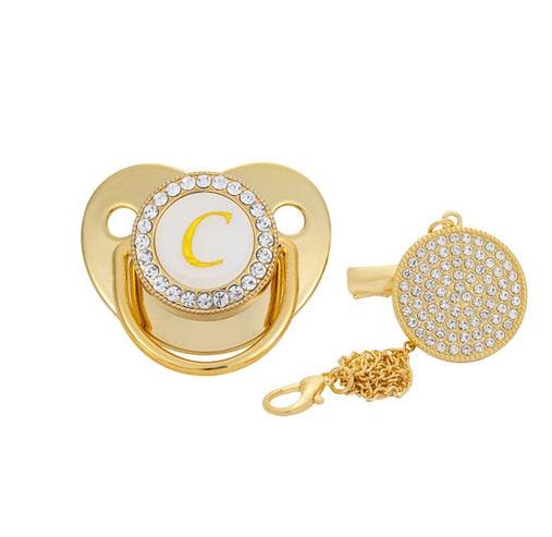 Chupeta Ouro Bling com a Letra Inicial do Seu Bebê - Lojas Promorin