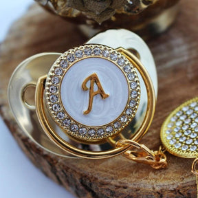 Chupeta Ouro Bling com a Letra Inicial do Seu Bebê - Lojas Promorin